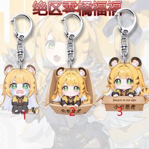 Three separate Zenless Zone Zero acrylic chibi keychains showing tiger-eared character Jufu crying, sitting inside a cardboard shipping box, and leaning over a box.