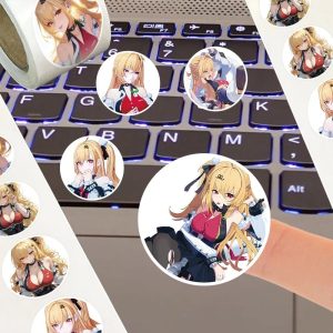Close-up of circular Cissia character stickers being applied to a laptop keyboard for DIY styling.