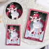 A premium Zenless Zone Zero merchandise set featuring character Ukiha Yuzuha as a white-winged angel on a round pin badge and inside rectangular acrylic quicksand mahjong blocks