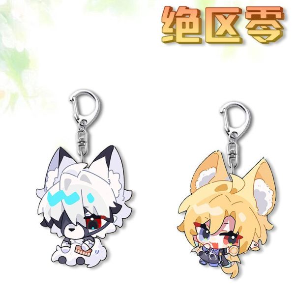 Two separate clear Zenless Zone Zero acrylic chibi keychains showing a white wolf character with mismatched eyes and a blonde fox character winking with large fluffy ears.