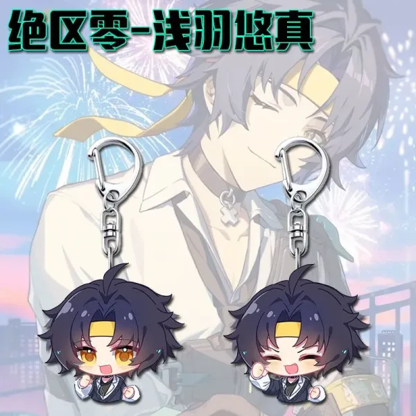 Two clear Zenless Zone Zero acrylic chibi keychains showing character Asaba Harumasa with a yellow headband smiling with wide orange eyes and winking with a raised fist.