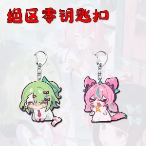 Two separate Zenless Zone Zero acrylic chibi keychains showing character Nanomiya Yu as a blushing green cat and character Irene as a pouting pink cat with twintail ears.