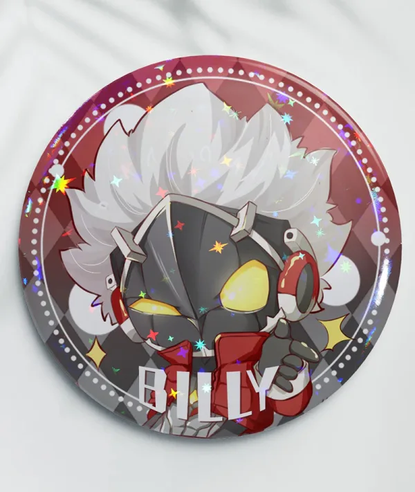 Two clear acrylic chibi keychains of Zenless Zone Zero character Billy Kid—one shooting a finger gun and one in a worried pose—alongside two round red holographic tinplate badges reflecting prism and star rainbow light patterns.