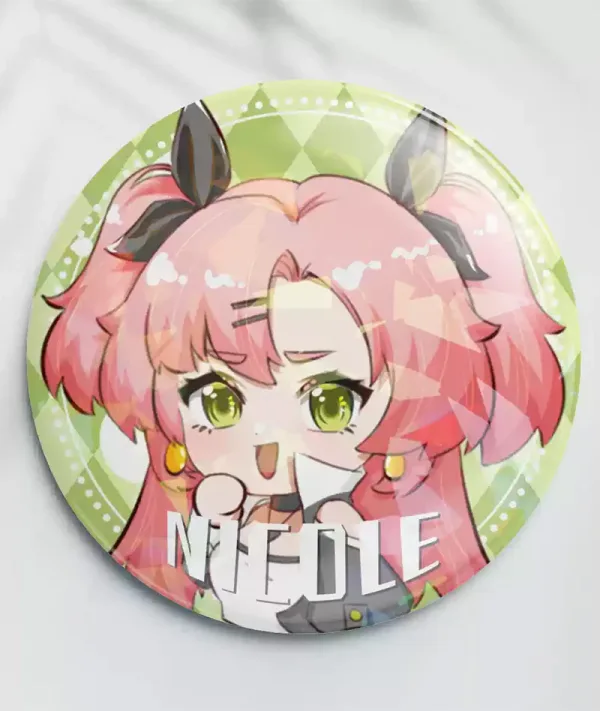 Two clear acrylic chibi keychains of Zenless Zone Zero character Nicole Demara—one solo and one hugging a green Amillion Bangboo—alongside two round green holographic tinplate badges reflecting star and prism rainbow light patterns.