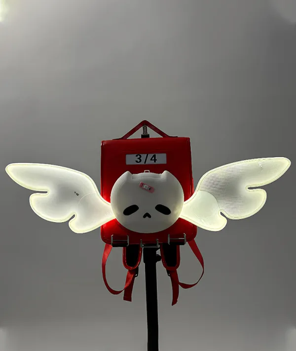 **Zenless Zone Zero anime plush keychain with glowing angel wings, cute collectible hanging pendant for keys, backpack, handbag and accessories, HoYoverse game merchandise for anime fans.**