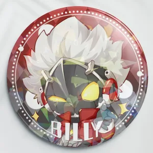 Two clear acrylic chibi keychains of Zenless Zone Zero character Billy Kid—one shooting a finger gun and one in a worried pose—alongside two round red holographic tinplate badges reflecting prism and star rainbow light patterns.