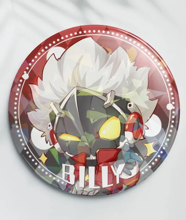 Two clear acrylic chibi keychains of Zenless Zone Zero character Billy Kid—one shooting a finger gun and one in a worried pose—alongside two round red holographic tinplate badges reflecting prism and star rainbow light patterns.