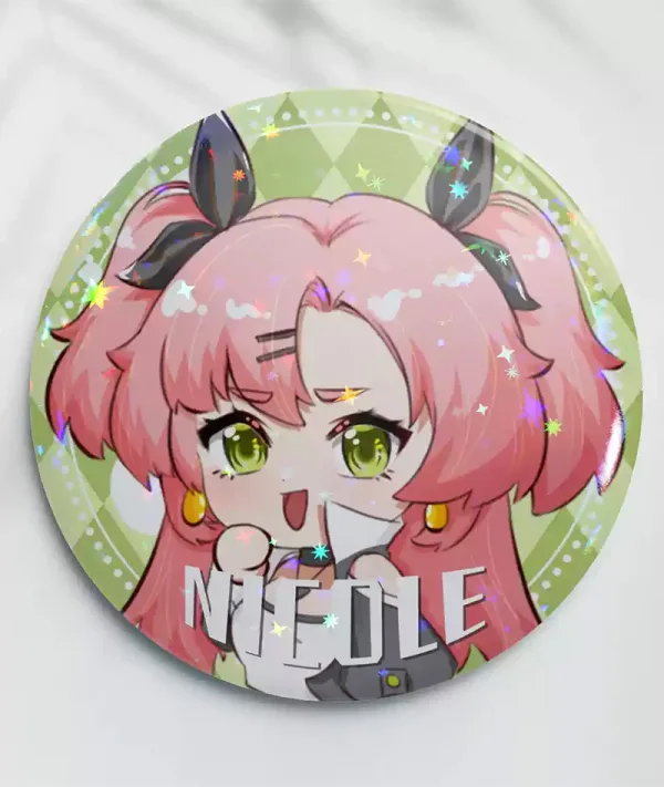 Two clear acrylic chibi keychains of Zenless Zone Zero character Nicole Demara—one solo and one hugging a green Amillion Bangboo—alongside two round green holographic tinplate badges reflecting star and prism rainbow light patterns.