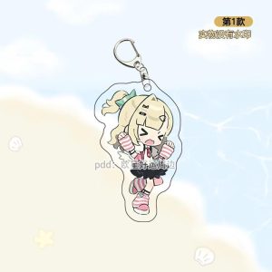 Three separate clear Zenless Zone Zero acrylic chibi keychains showing characters Cephora, Nanomiya Yu, and Irene as virtual angels with colorful wings and happy expressions.