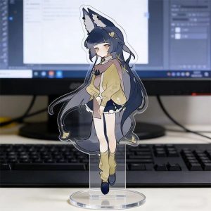Clear acrylic desktop standees of cute Zenless Zone Zero characters in casual clothing standing on round transparent bases, displayed in front of a computer monitor on a desk.