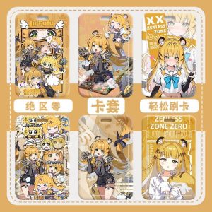 Multiple hard-shell sliding card holders featuring Zenless Zone Zero characters Ju Fufu and Yixuan in yellow and white themes. The front displays vibrant anime artwork and comic panels, while the back includes a large clear transparent display window and top lanyard slot.