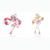 Clear acrylic desktop standees featuring Zenless Zone Zero anime characters standing upright on transparent oval bases, displayed in full-color dynamic poses with detailed outfits.