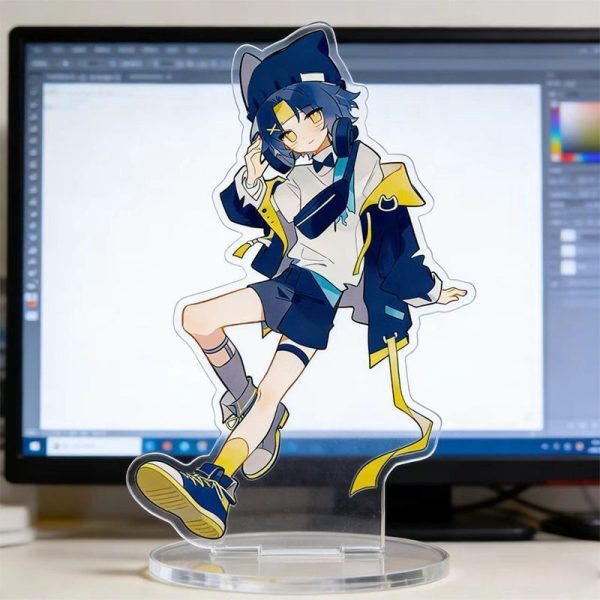 Clear acrylic desktop standees of cute Zenless Zone Zero characters in casual clothing standing on round transparent bases, displayed in front of a computer monitor on a desk.