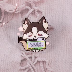 A catalog image showing five variations of clear acrylic pins featuring the husky dog Howl from Zenless Zone Zero holding different lucky scratch tickets, including bones, dog food, wolf faces, meat, and golden poop.