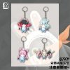 Funny fan-made Zenless Zone Zero acrylic keychains featuring chibi characters in goofy poses, shark sleeping bags, drill vehicles, and holding red roses with cheeky face expressions.