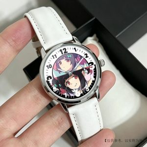 Round silver Zenless Zone Zero anime quartz wristwatch with white leather strap featuring colorful chibi anime character illustrations on the dial.