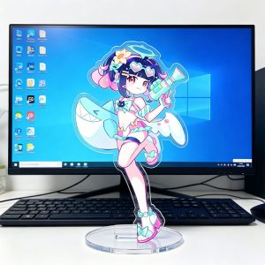 Zenless Zone Zero acrylic standees featuring three anime characters in pastel swimsuits with summer accessories standing in front of a computer screen.