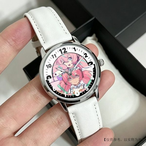 Round silver Zenless Zone Zero anime quartz wristwatch with white leather strap featuring colorful chibi anime character illustrations on the dial.